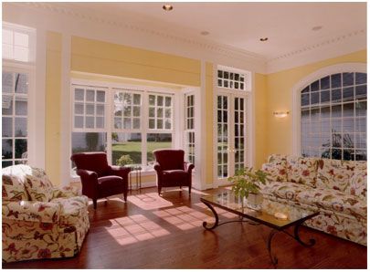 • Click for larger view of this White home, with front vinyl Bay window, white vinyl trim and a grey roof •