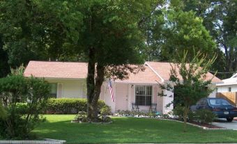 • Click for larger view of this home we built for our grandfather, with light peach roof and trim •